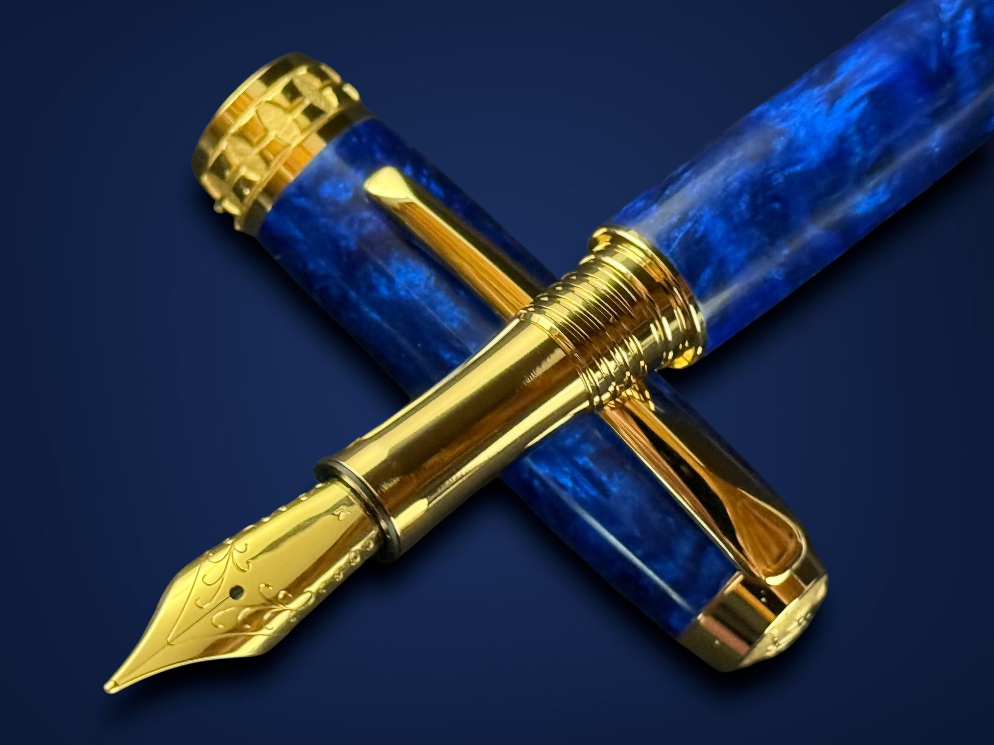 “Luxury Crown Jewel fountain pen by Highlander with sapphire resin and gold nib”