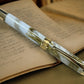 Elegant “Gold Marble” Gold Rollerball Pen, Artisan Handcrafted Writing Instrument. Handmade with Custom Hardware in Colorado. One of a Kind. - HighlanderPen