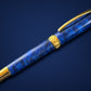 “Handcrafted Deep Sapphire pen with gold trim, artisan writing instrument”