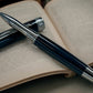 Exotic Gaboon Ebony Black Titanium Rollerball Pen, Artisan Handcrafted Writing Instrument. Handmade Custom in Colorado. One of a Kind. - HighlanderPen