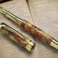 Striking “Blood Orange & Gold" Gold Rollerball Pen, Artisan Handcrafted Writing Instrument. Handmade Custom in Colorado. One of a Kind. - HighlanderPen