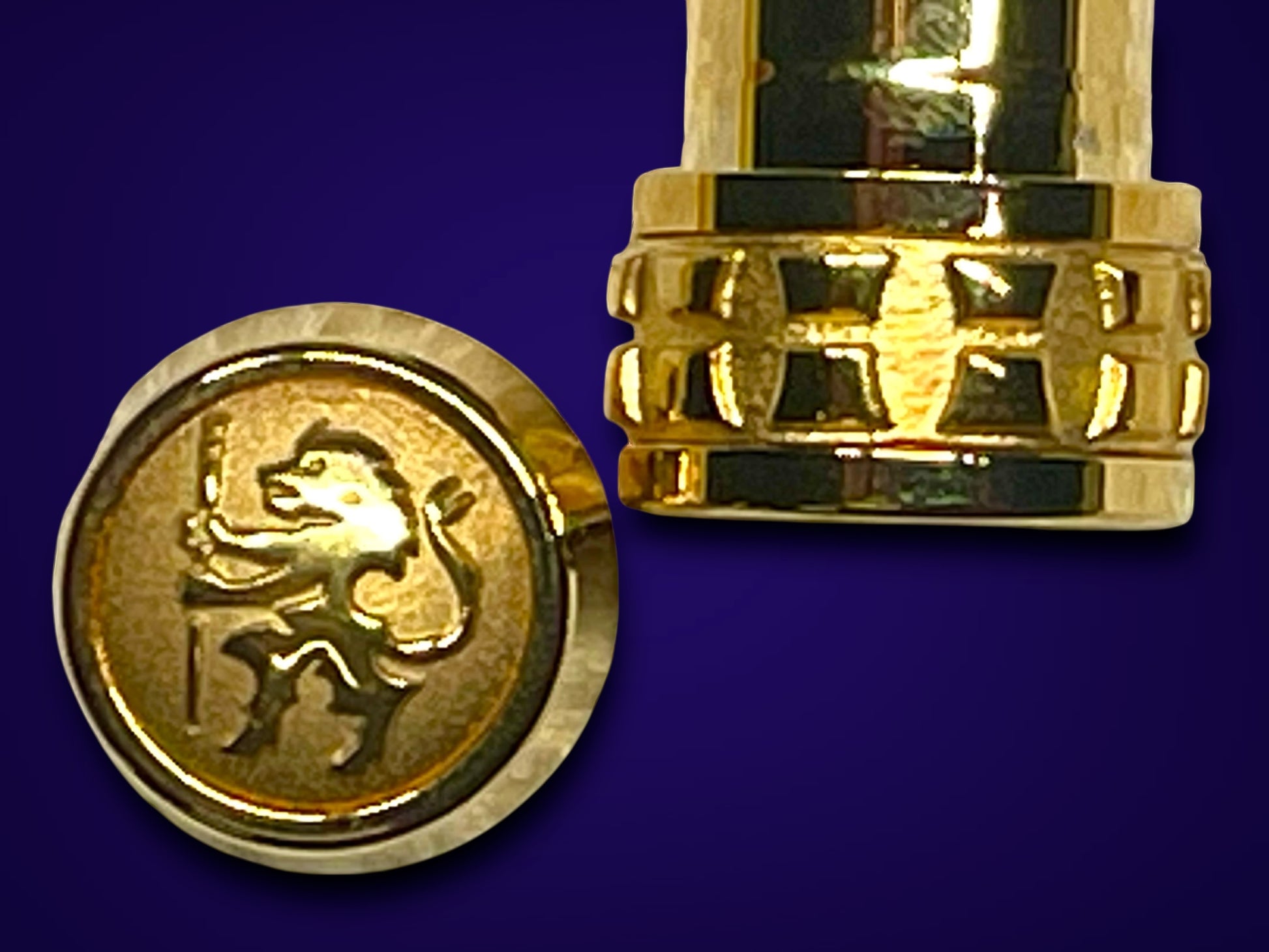 Gold cap with a lion emblem on a blue background