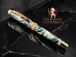  “Narwhal's” Highlander Collection Red Gold Rollerball Pen. A Custom Blend Of Velvet Blue, Light Green Tinged with Grey Nuances, Silver, And Khaki.