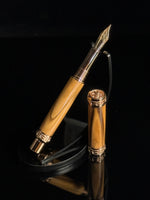 Fountain pen with wooden handle and gold accents on a black background