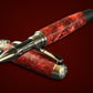 “Radiant Ruby” | Black Titanium Rollerball Pen | Highlander Collection