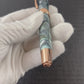 Rose Gold “Narwhals” Handmade Rollerball Pen. One of a Kind, Handcrafted by Highlander Pen in Colorado. Box, Sleeve, & Ink Included. [ML-RB-1213-01]